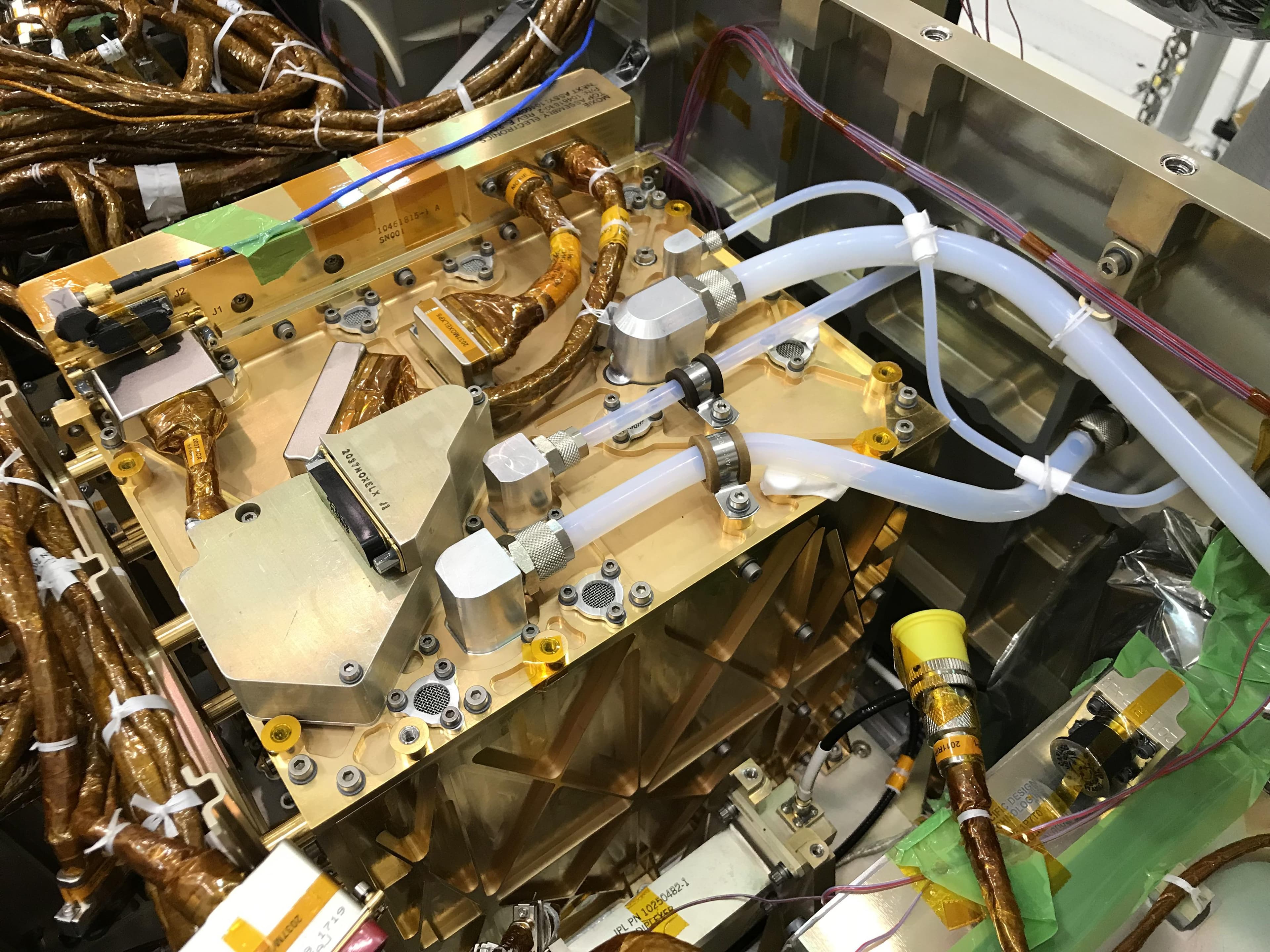 The MOXIE instrument installed inside NASA's Perseverance rover prior to launch.